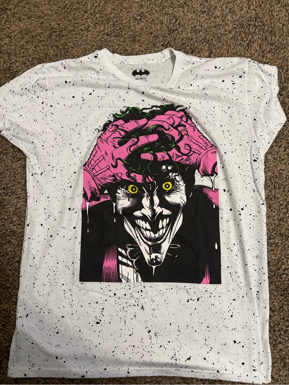 Batman White Speckled Tee with Pink Joker Graphic and Yellow Eyes